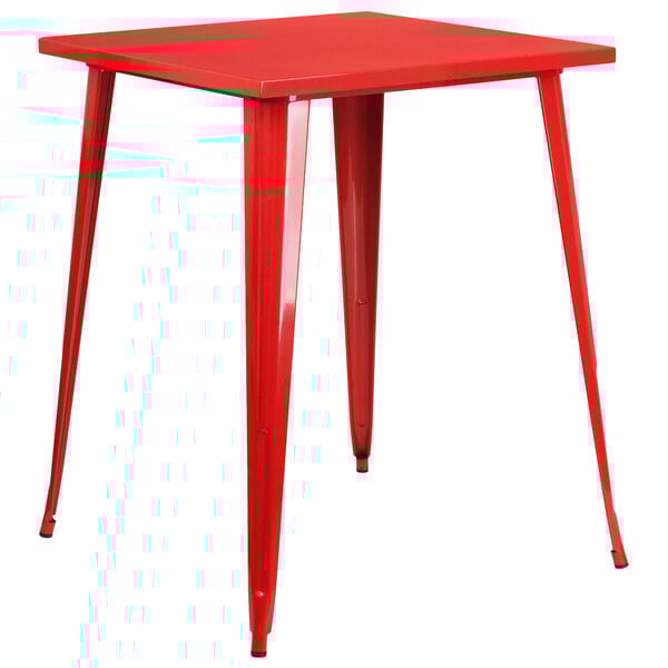 A red square Flash Furniture metal table with legs.
