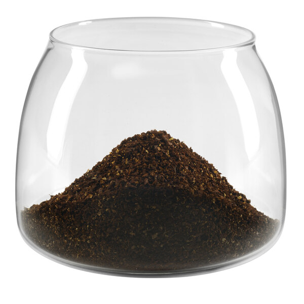 A KitchenAid glass jar filled with coffee.