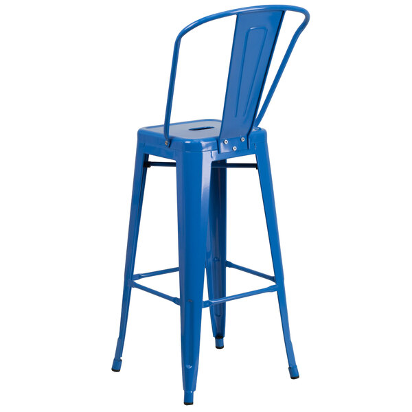 A blue metal Flash Furniture bar height stool with a vertical slat back.