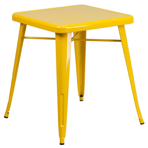 A Flash Furniture yellow metal square cafe table with legs.