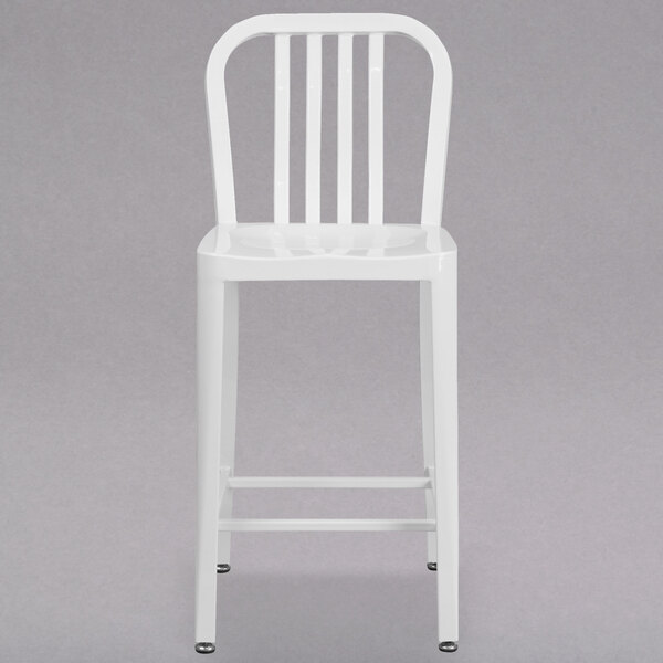 A white metal Flash Furniture counter height stool with a vertical slat back.