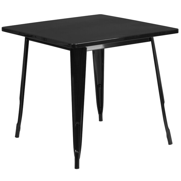 A Flash Furniture black metal square cafe table with legs.