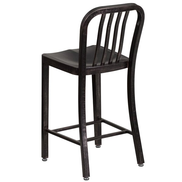A Flash Furniture black metal counter height stool with a vertical slat back.