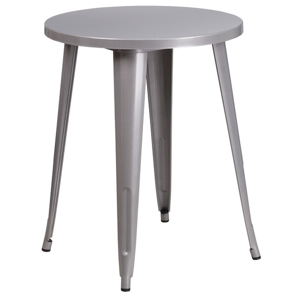 A Flash Furniture silver metal round table with legs.