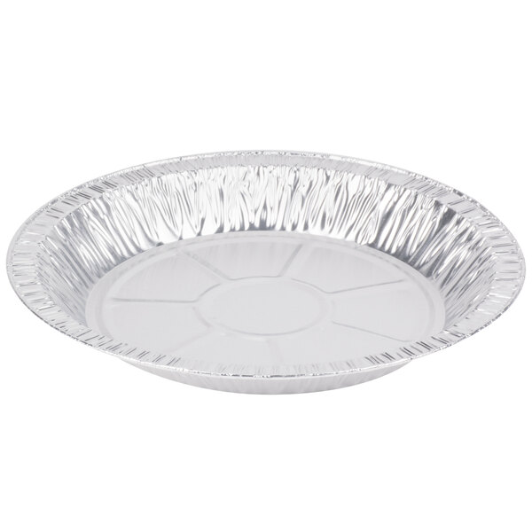 A round aluminum D&W Fine Pack foil pie pan with a circular edge.