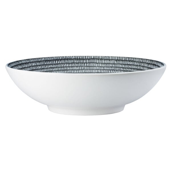 A white Oneida porcelain bowl with black lines on it.