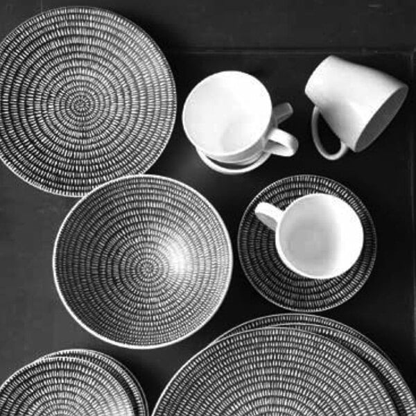 Oneida Urban Storm porcelain bowls on a table with dishes.