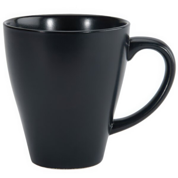 A close-up of a Luzerne Urban by Oneida black porcelain mug with a handle.