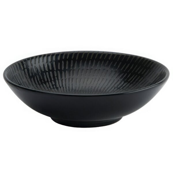 A Luzerne Urban by Oneida black porcelain bowl with a pattern on it.