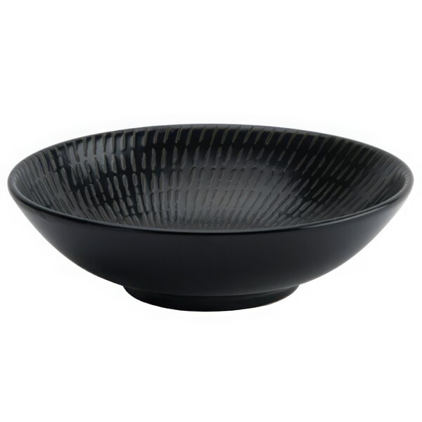 A black Luzerne Urban by Oneida porcelain bowl with a pattern on it.