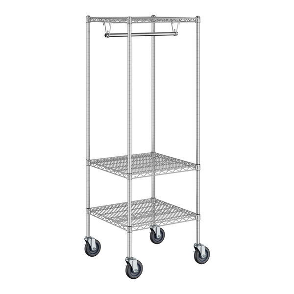 A Regency chrome wire garment rack with wheels.