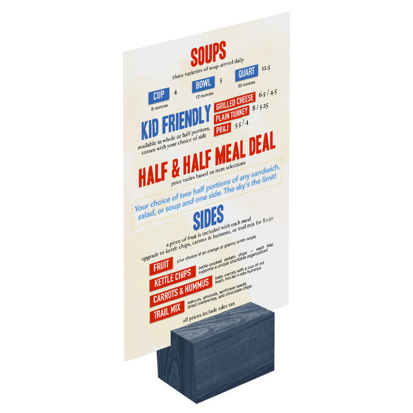 A Menu Solutions wooden rectangular card holder with a menu on a table.