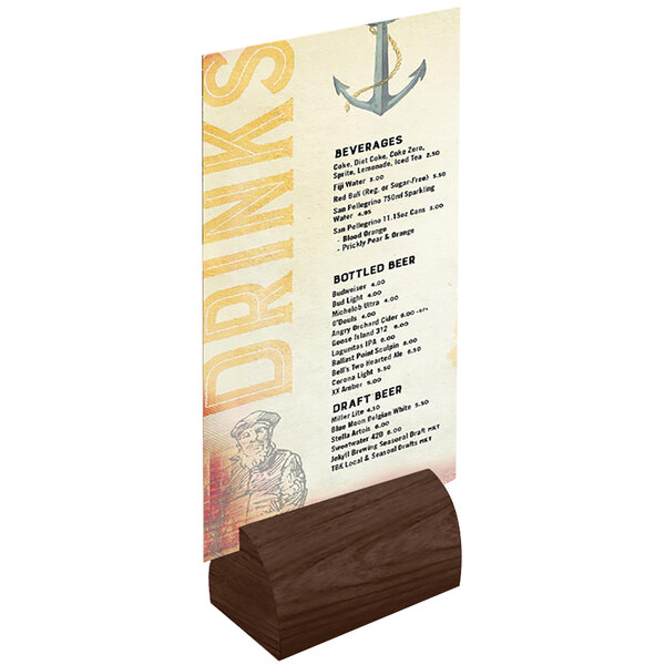 A walnut wood curved table card holder with a menu card on it.