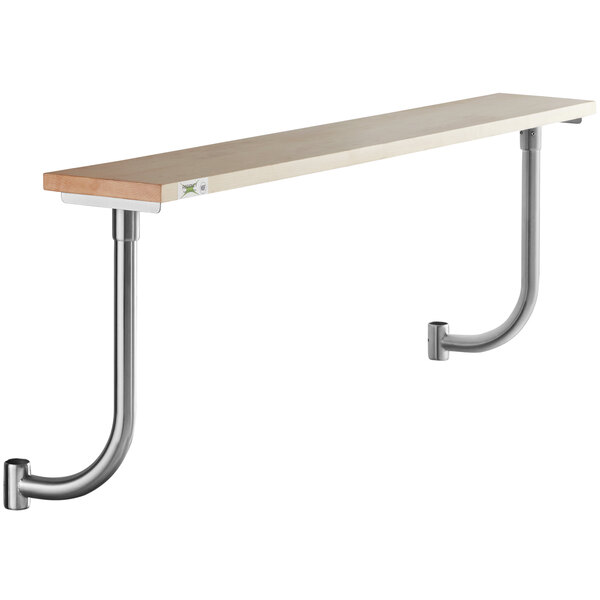 A long wooden shelf with metal pipe on the ends.