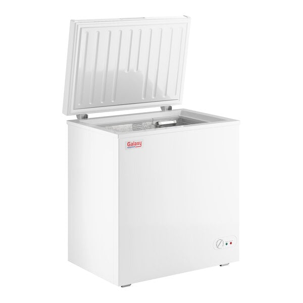 A white commercial chest freezer with an open lid and a 5.2 cubic foot capacity.