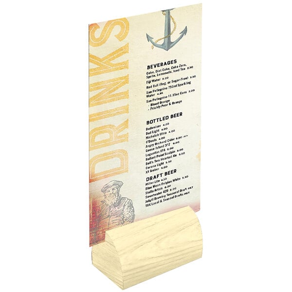 A natural wood curved table card holder with a menu card in it.