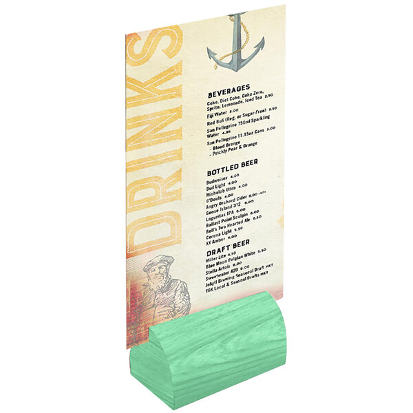 A teal wood curved card holder on a table with a menu card.