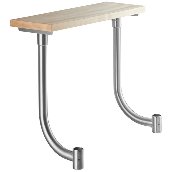 A Regency wooden cutting board on a metal table with metal legs.