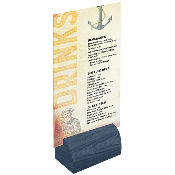 A Menu Solutions curved wooden table card holder with a menu card on it.