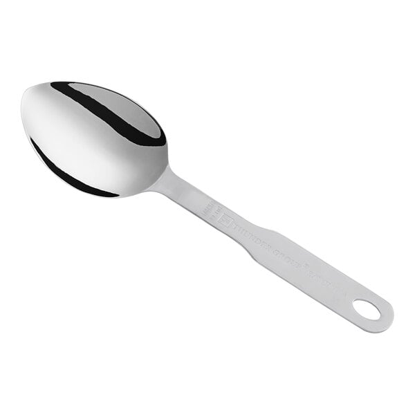 A stainless steel Thunder Group measuring spoon with a silver handle.
