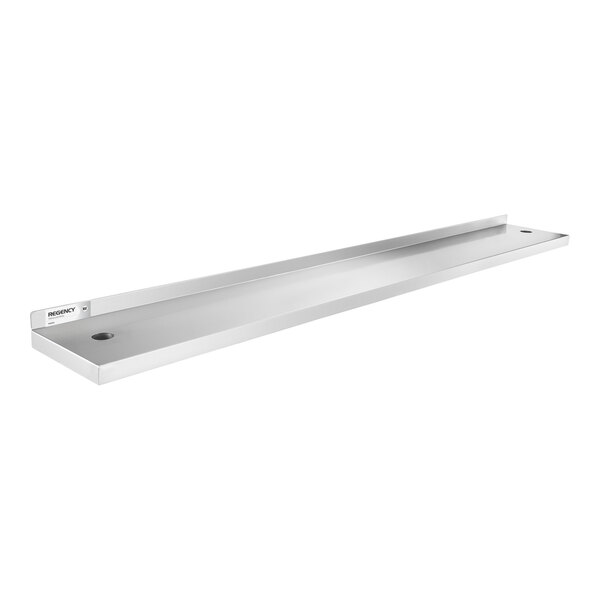 A long, rectangular stainless steel shelf with a raised back edge and two mounting holes, viewed from an angle.