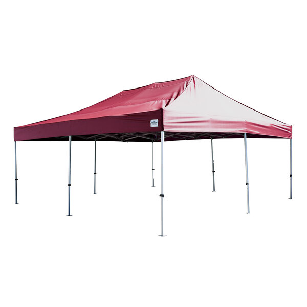 A red Caravan Canopy tent with poles.