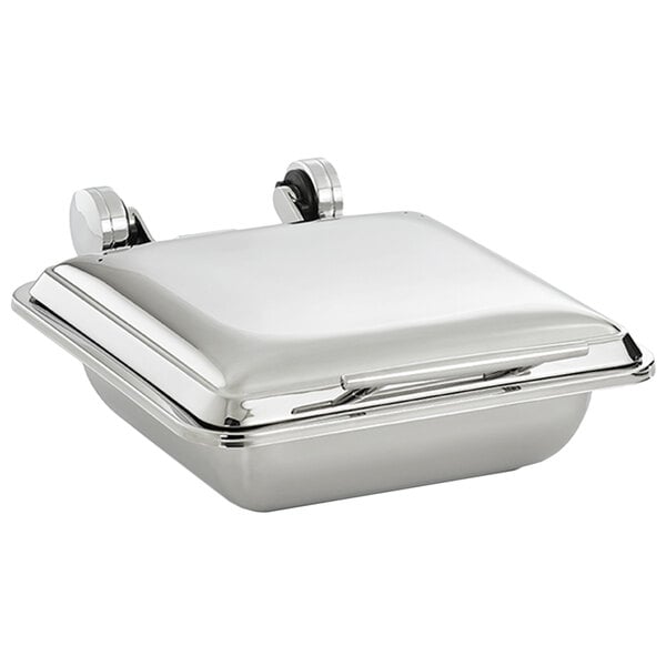 A Vollrath square silver induction chafer with a stainless steel lid.