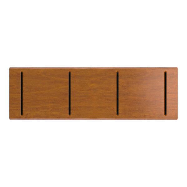A rectangular wooden tabletop with a rustic walnut finish and four evenly spaced black vertical inlays.
