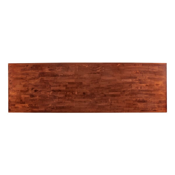 A Lancaster Table & Seating rectangular wooden table top with a mahogany finish.