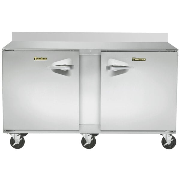 A large stainless steel Traulsen worktop freezer with two doors.