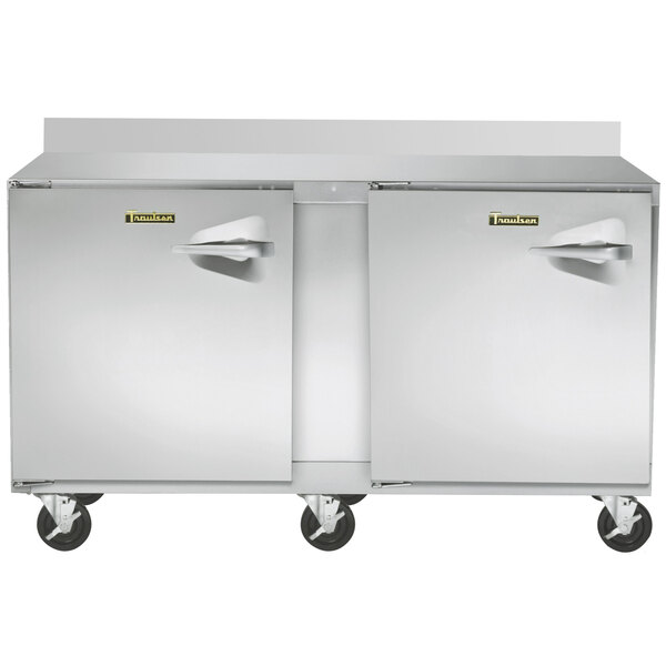 A Traulsen stainless steel worktop freezer with two doors.