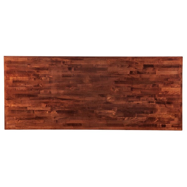 A rectangular wood table top with a mahogany finish.