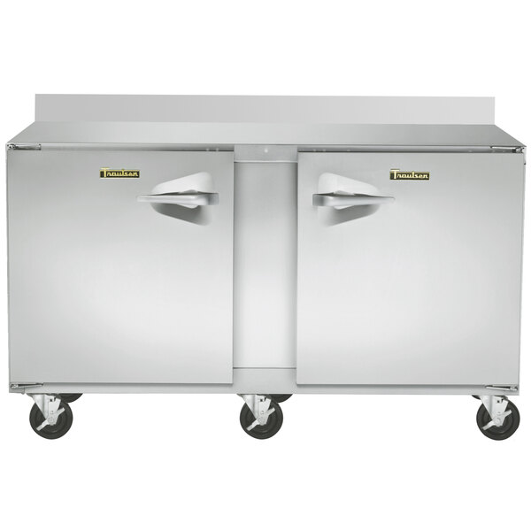 A large stainless steel Traulsen worktop freezer with two doors.