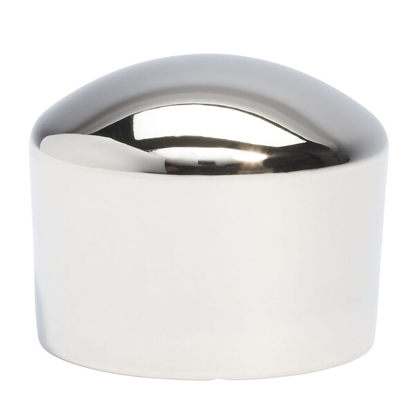 A shiny silver iSi cap.