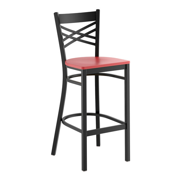 A black metal bar stool with a cross back design and a mahogany wood seat.