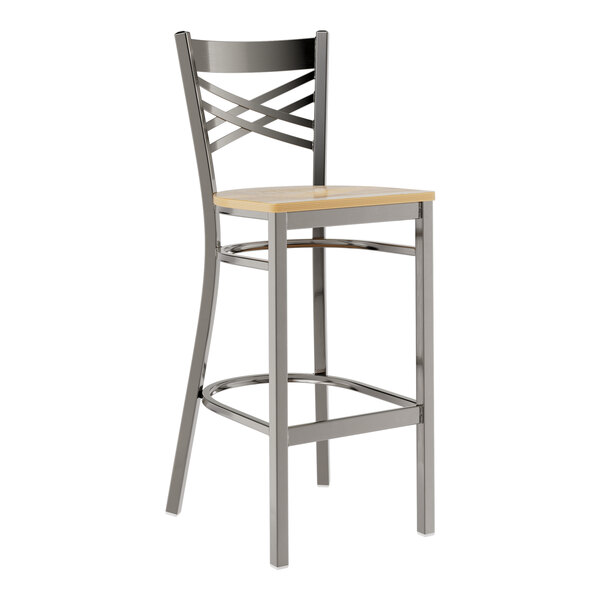 A metal bar stool with a cross back design and a light wood seat.
