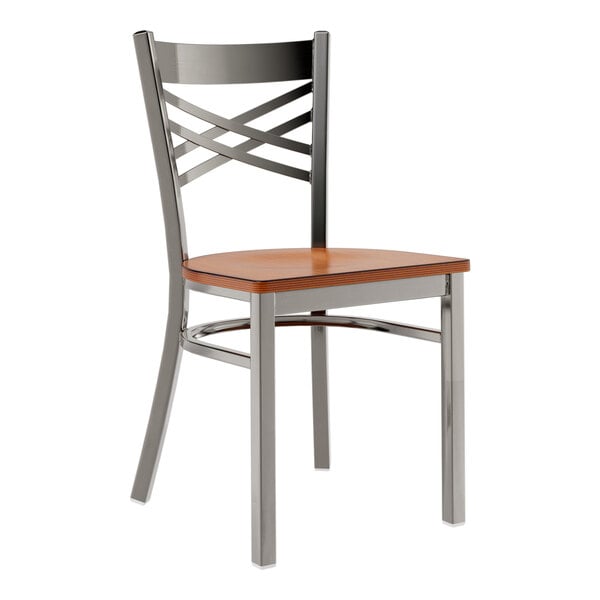 A Lancaster Table & Seating cross back chair with a wood seat and clear coat finish.