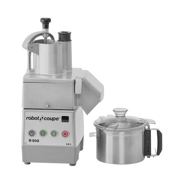 A Robot Coupe commercial food processor with a lid on a bowl.