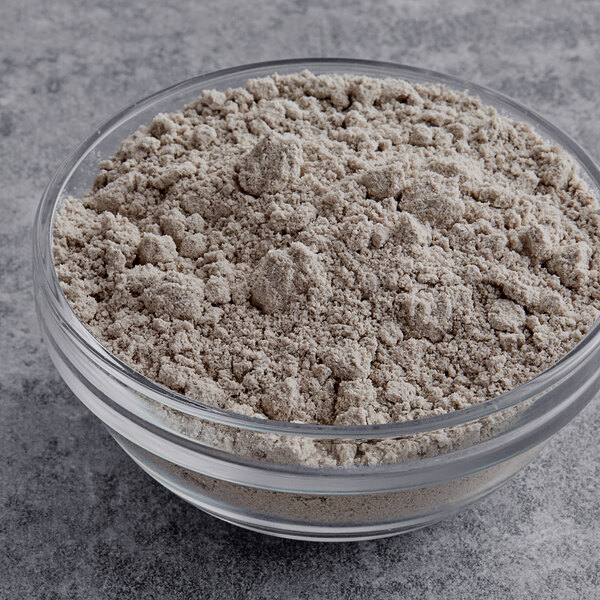 A bowl of chocolate cake mix powder.