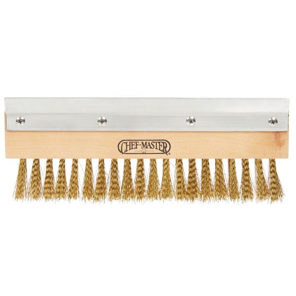 A Chef Master pizza oven brush head with gold bristles.