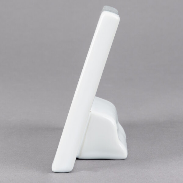 A white rectangular American Metalcraft ceramic card sign.