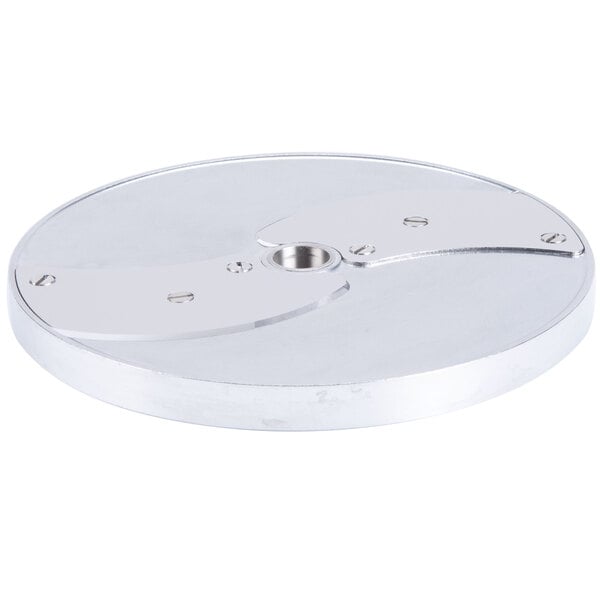 A stainless steel circular plate with holes and a hole in the center.