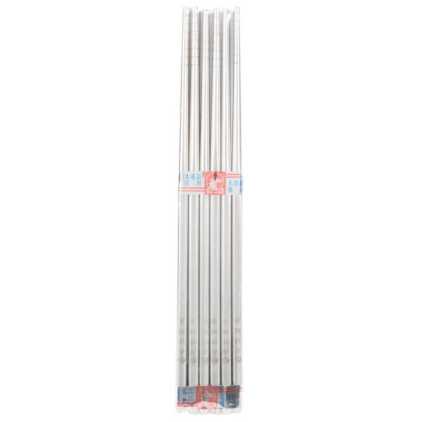A pack of silver stainless steel chopsticks with black lines on a white background.