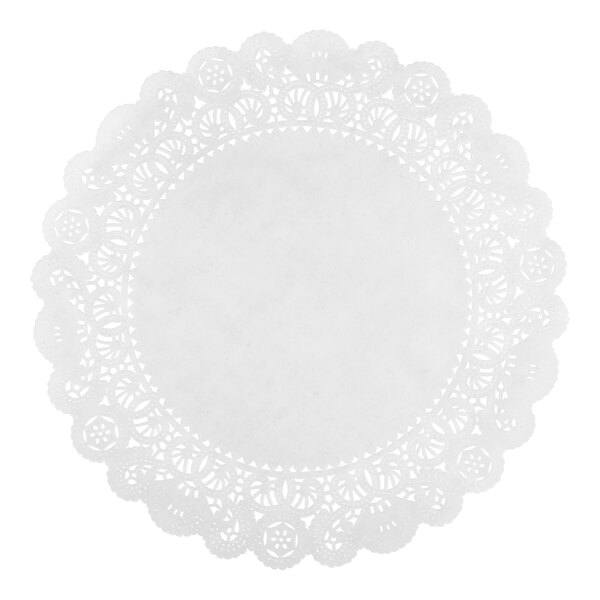 A round white paper doily with an intricate lace-like pattern around the edges.