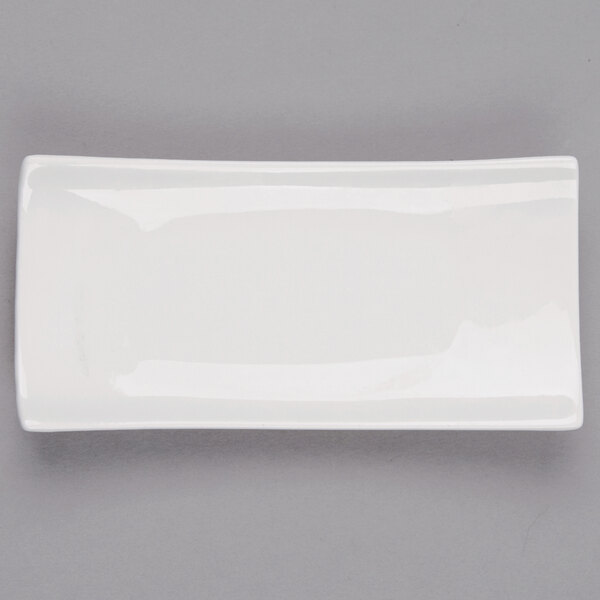 An Arcoroc rectangular porcelain plate with a small white rim.