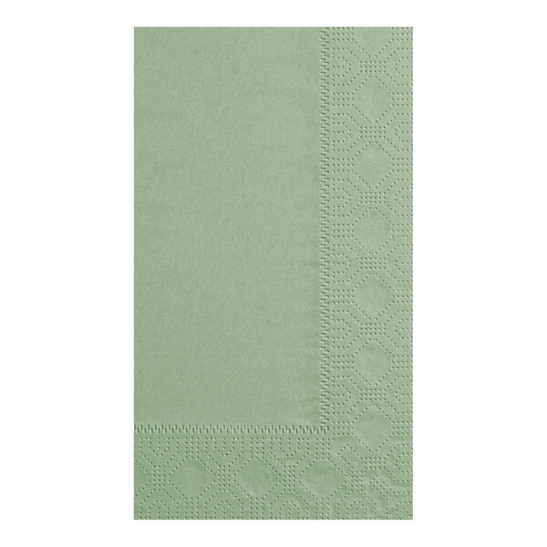 A green napkin with a diamond pattern.