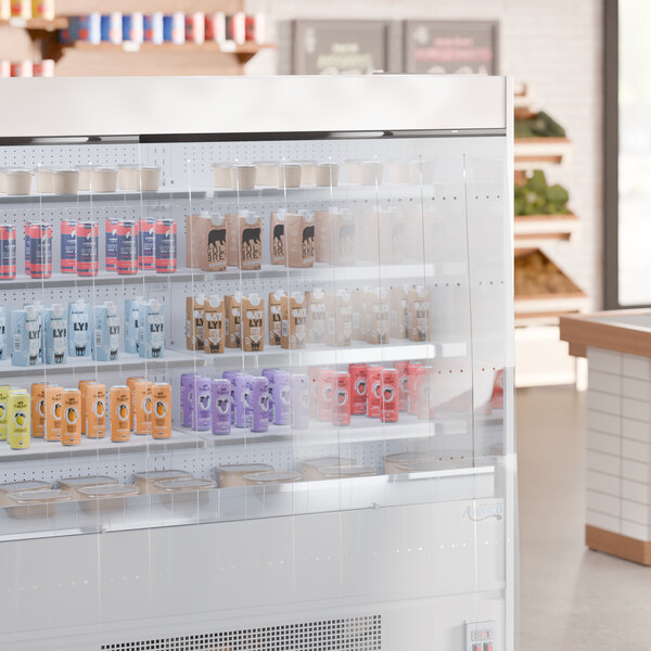 A 48-inch by 43-inch display cooler with a clear strip curtain for commercial use.