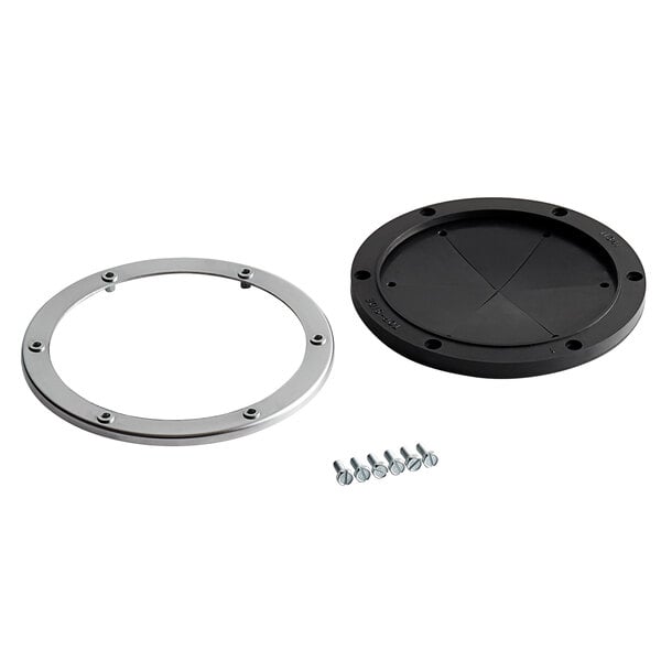 A silver and black circular metal adapter with screws.