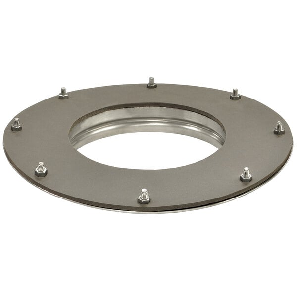 A circular metal Salvajor disposer adapter with screws and a hole.