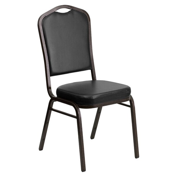 A black Flash Furniture banquet chair with a black vinyl seat.
